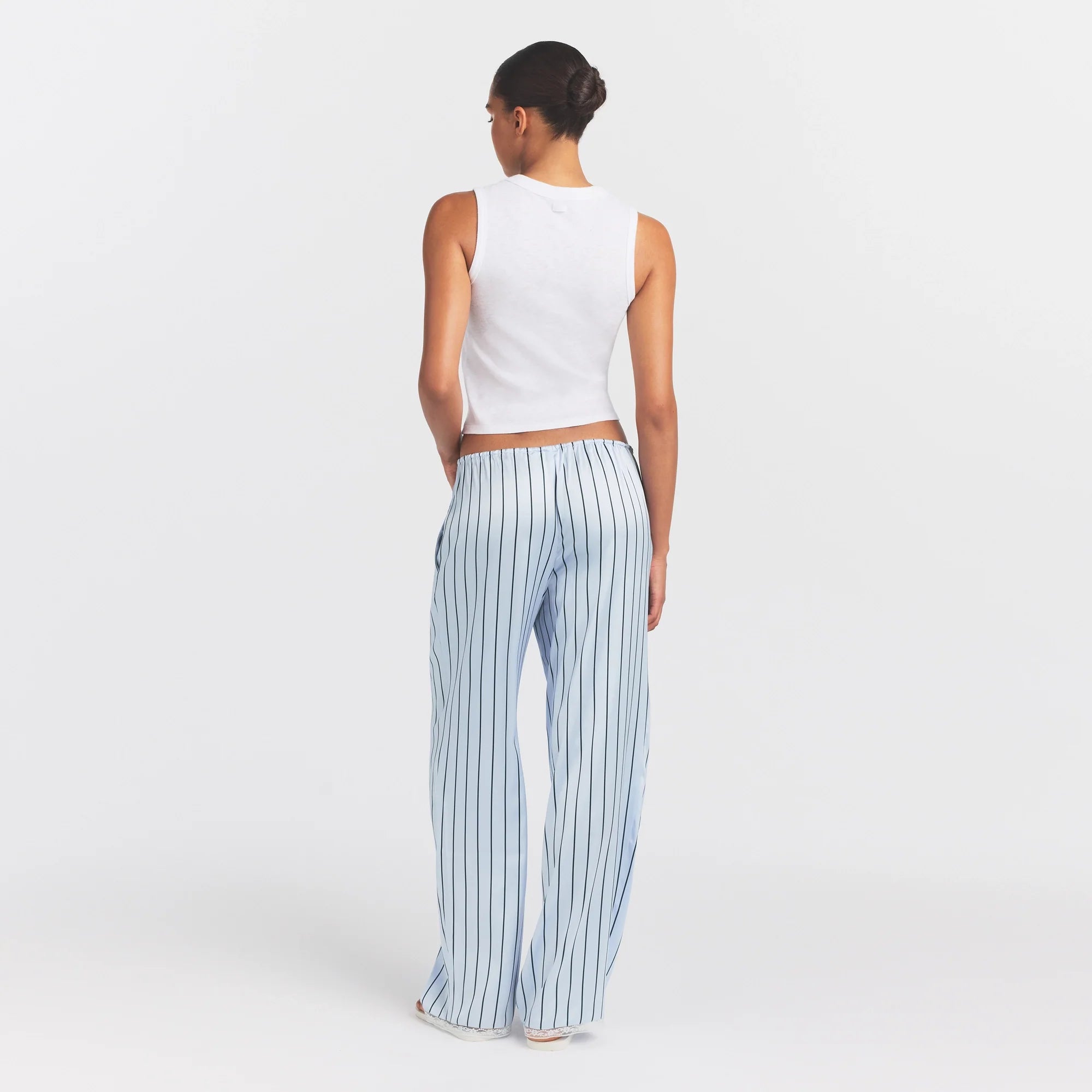 WOVEN SHINE LACE PANT | PERIWINKLE WIDE STRIPE ON A MODEL FRONT VIEW @ | FOCUS: 0.0, 1.0, 0.9