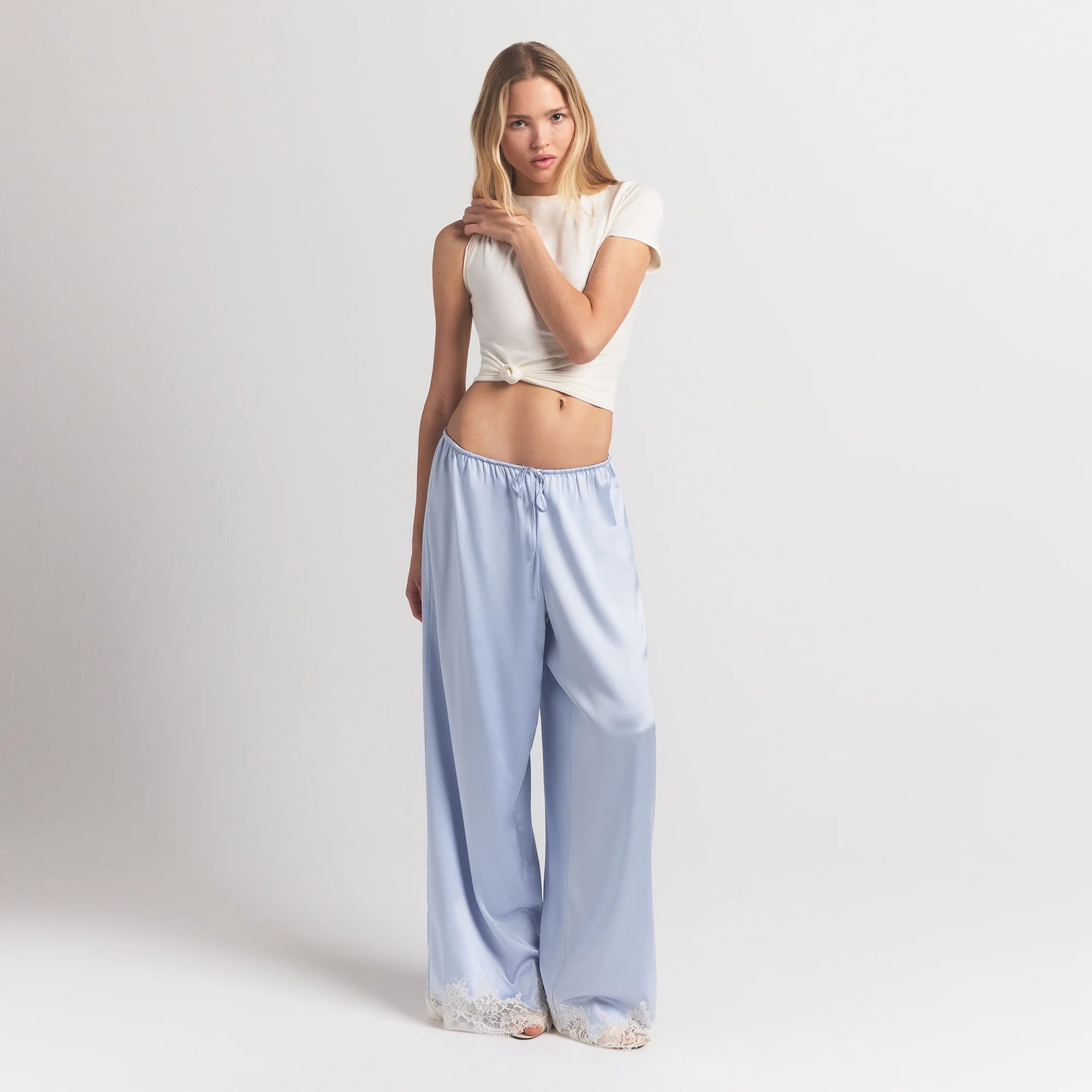 SILK LACE PANT | PERIWINKLE CONTRAST ON A MODEL FRONT VIEW @ | FOCUS: 0.0, 1.0, 0.9