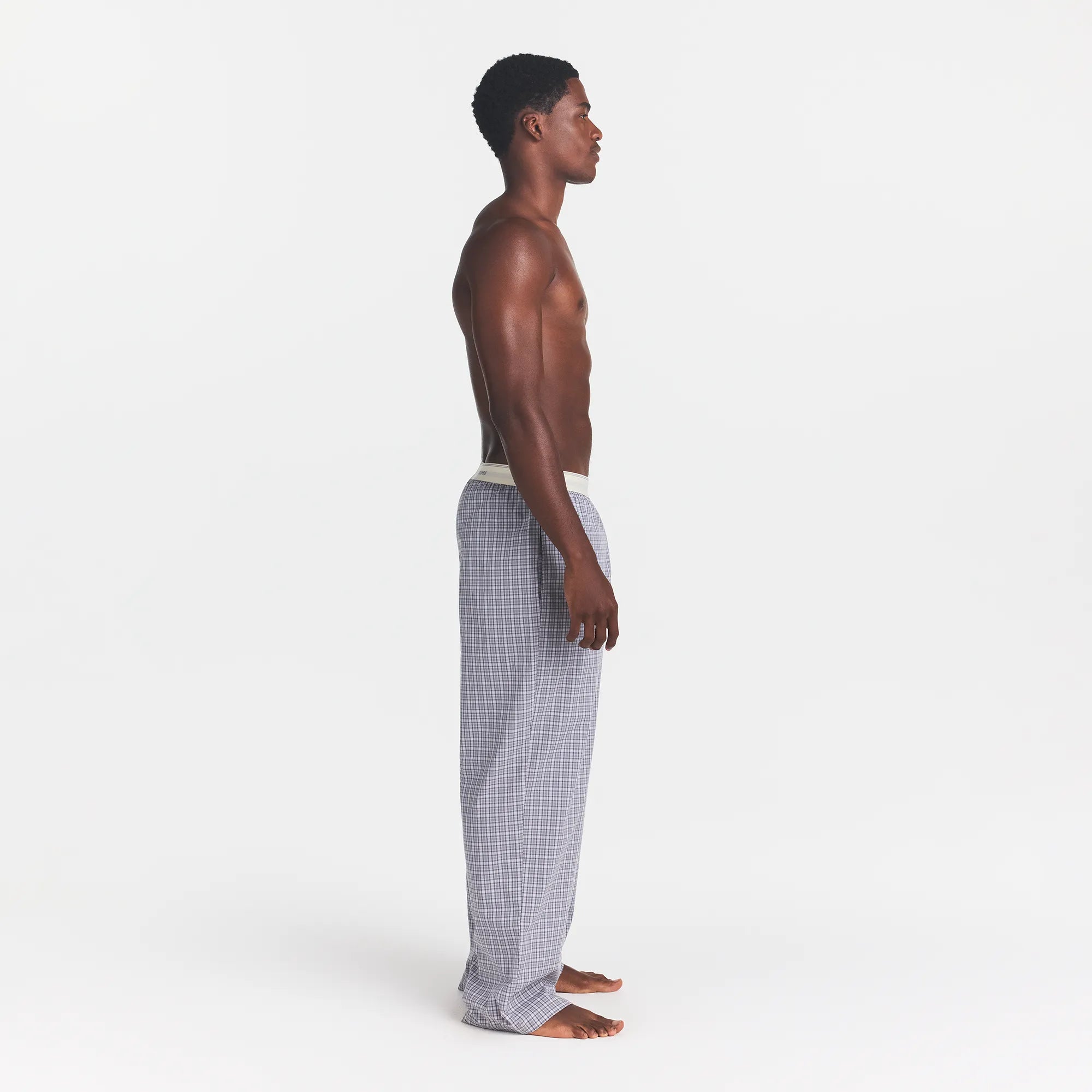 COTTON POPLIN MENS LOGO BAND SLEEP PANT | FULL MOON CHECK ON A MODEL SIDE VIEW @ | FOCUS: 0.0, 1.0, 0.9