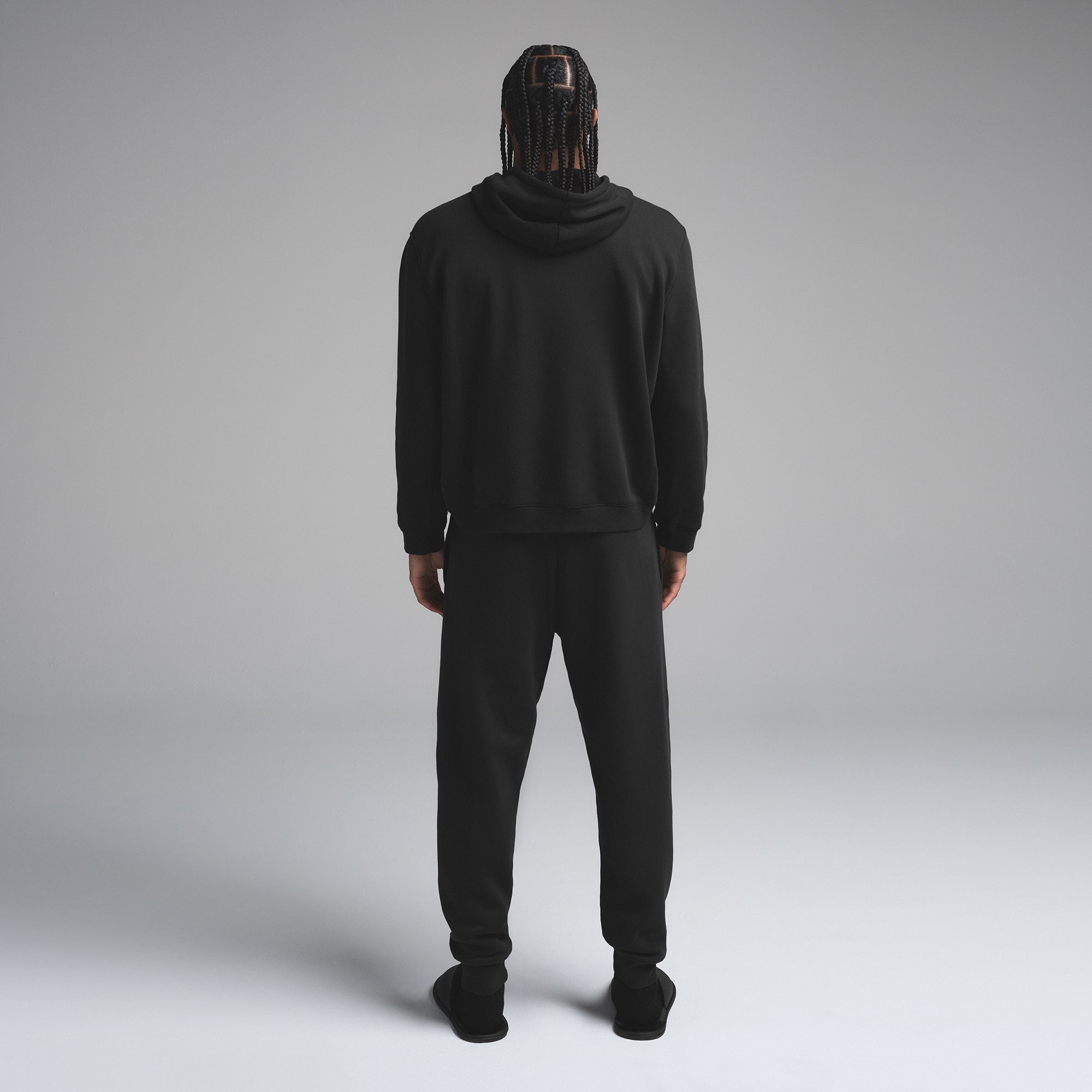 FLEECE LOUNGE MENS TAPERED JOGGER | WASHED ONYX ON A MODEL SIDE VIEW | FOCUS: 0.0, 1.0, 0.9