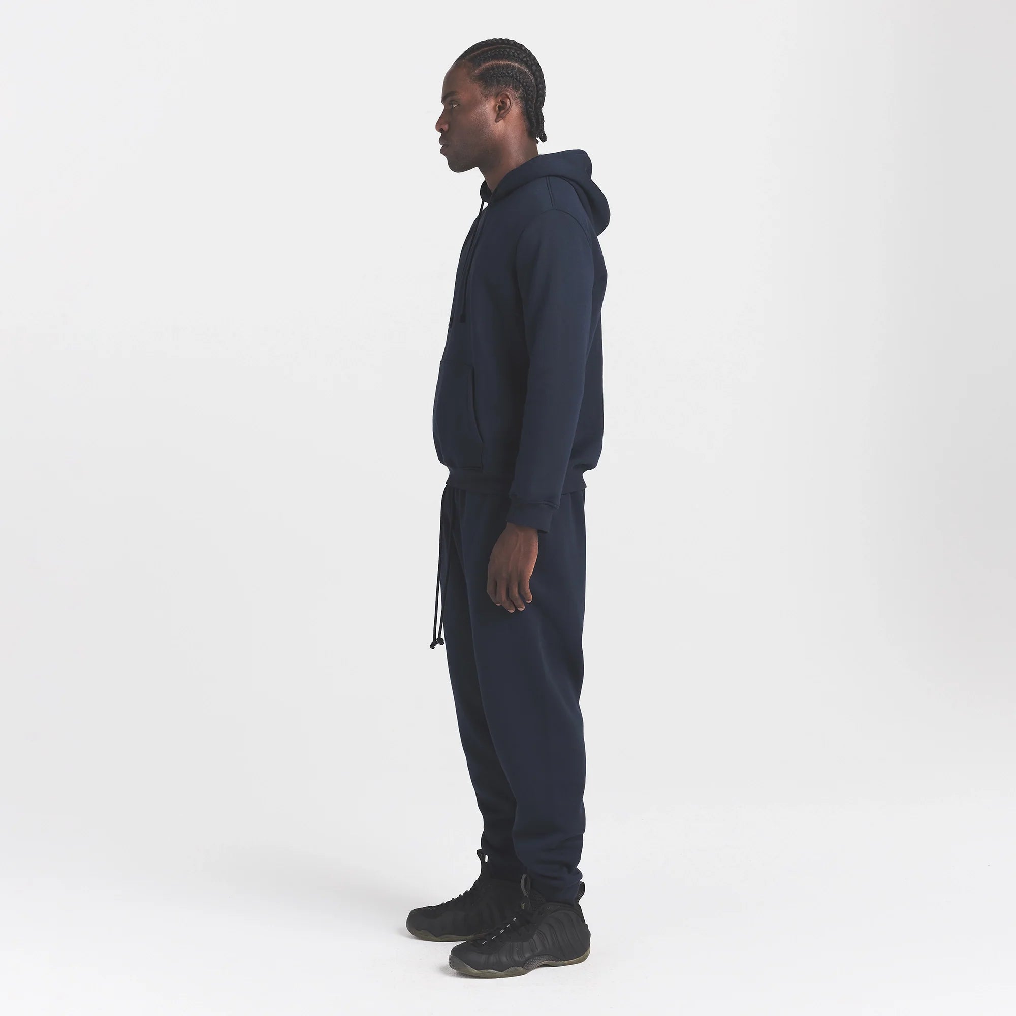 FLEECE LOUNGE MENS TAPERED JOGGER | NAVY ON A MODEL SIDE VIEW @ | FOCUS: 0.0, 1.0, 0.9