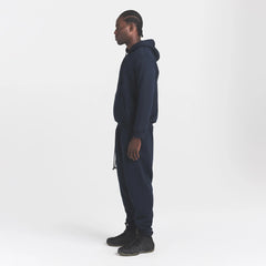 FLEECE LOUNGE MENS TAPERED JOGGER | NAVY ON A MODEL SIDE VIEW @ | FOCUS: 0.0, 1.0, 0.9