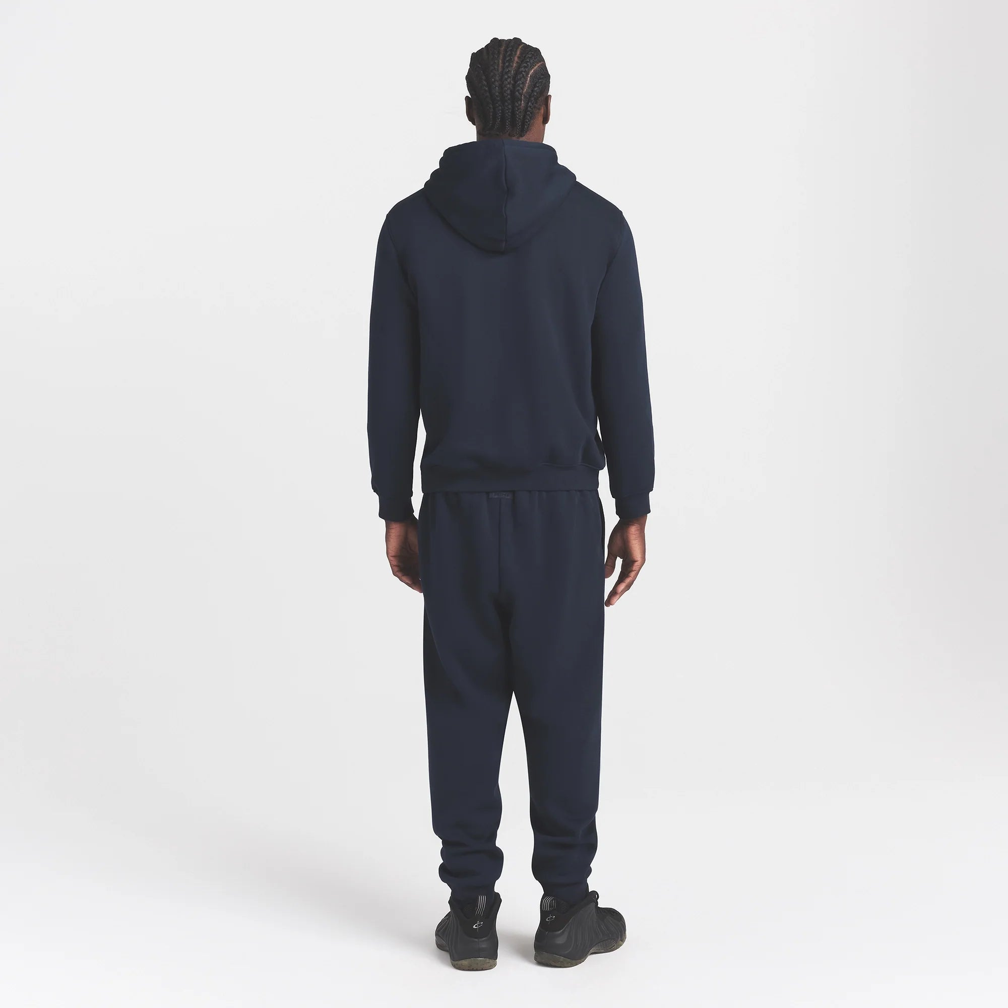 FLEECE LOUNGE MENS TAPERED JOGGER | NAVY ON A MODEL BACK VIEW @ | FOCUS: 0.0, 1.0, 0.9