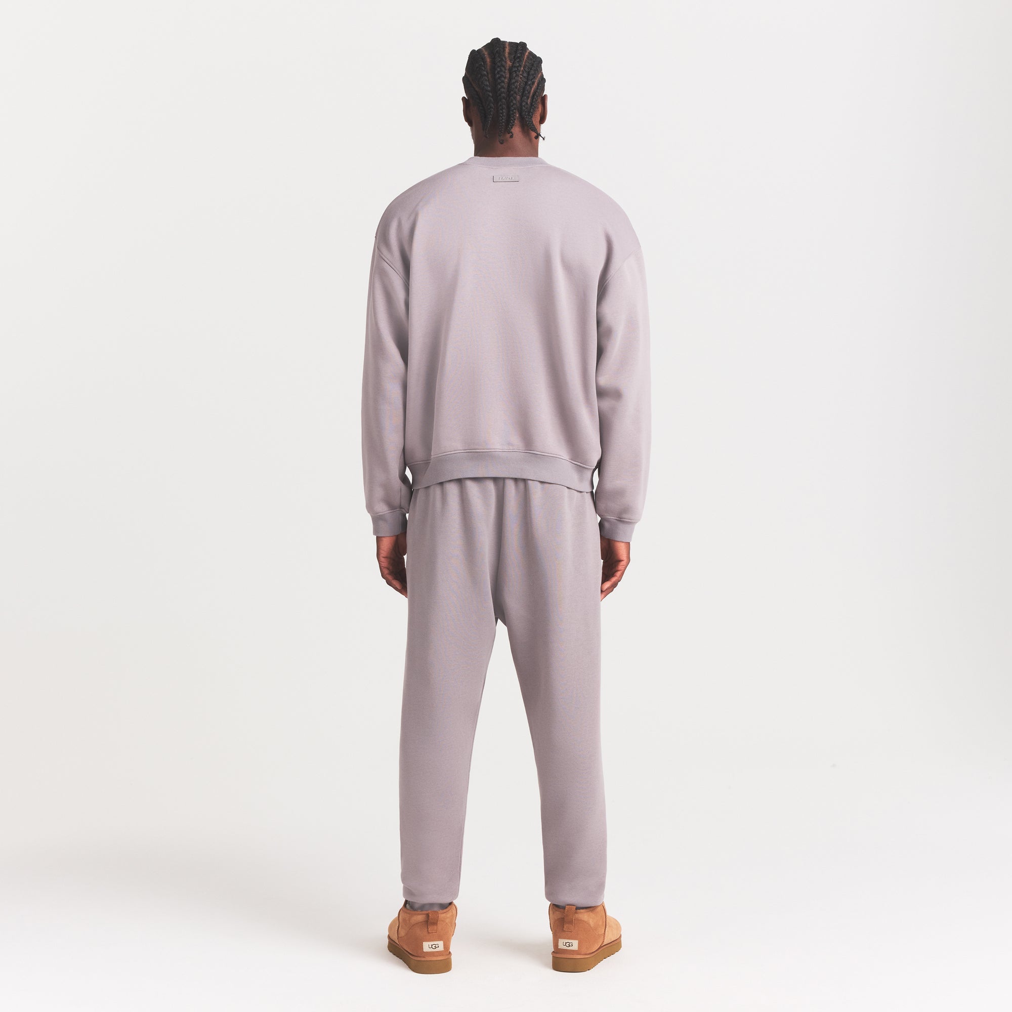 FLEECE LOUNGE MENS TAPERED JOGGER | SHADOW ON A MODEL FRONT VIEW @ | FOCUS: 0.0, 1.0, 0.9