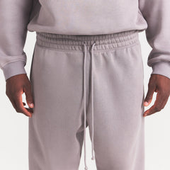 FLEECE LOUNGE MENS TAPERED JOGGER | SHADOW ON A MODEL SIDE VIEW @ | FOCUS: 0.0, 1.0, 0.9