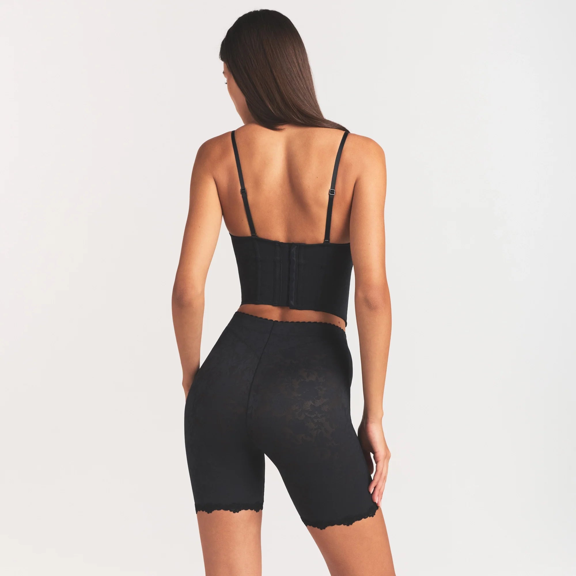LACE SHAPEWEAR SHORT | ONYX ON A MODEL SIDE VIEW @