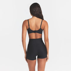 SKIMS BODY CORE SCULPT SHORTIE | ONYX ON A MODEL BACK VIEW @