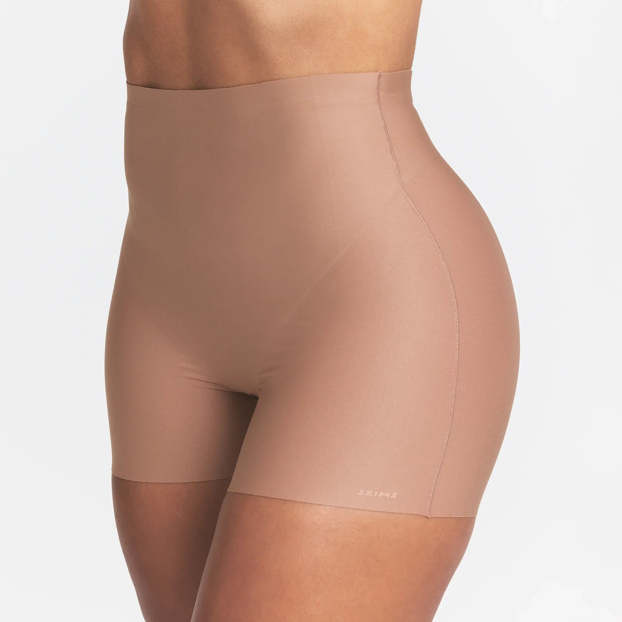 SKIMS BODY CORE SCULPT SHORTIE | SIENNA ON A MODEL SIDE VIEW @