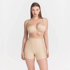 SKIMS BODY CORE SCULPT SHORTIE | SAND ON A MODEL FRONT VIEW @