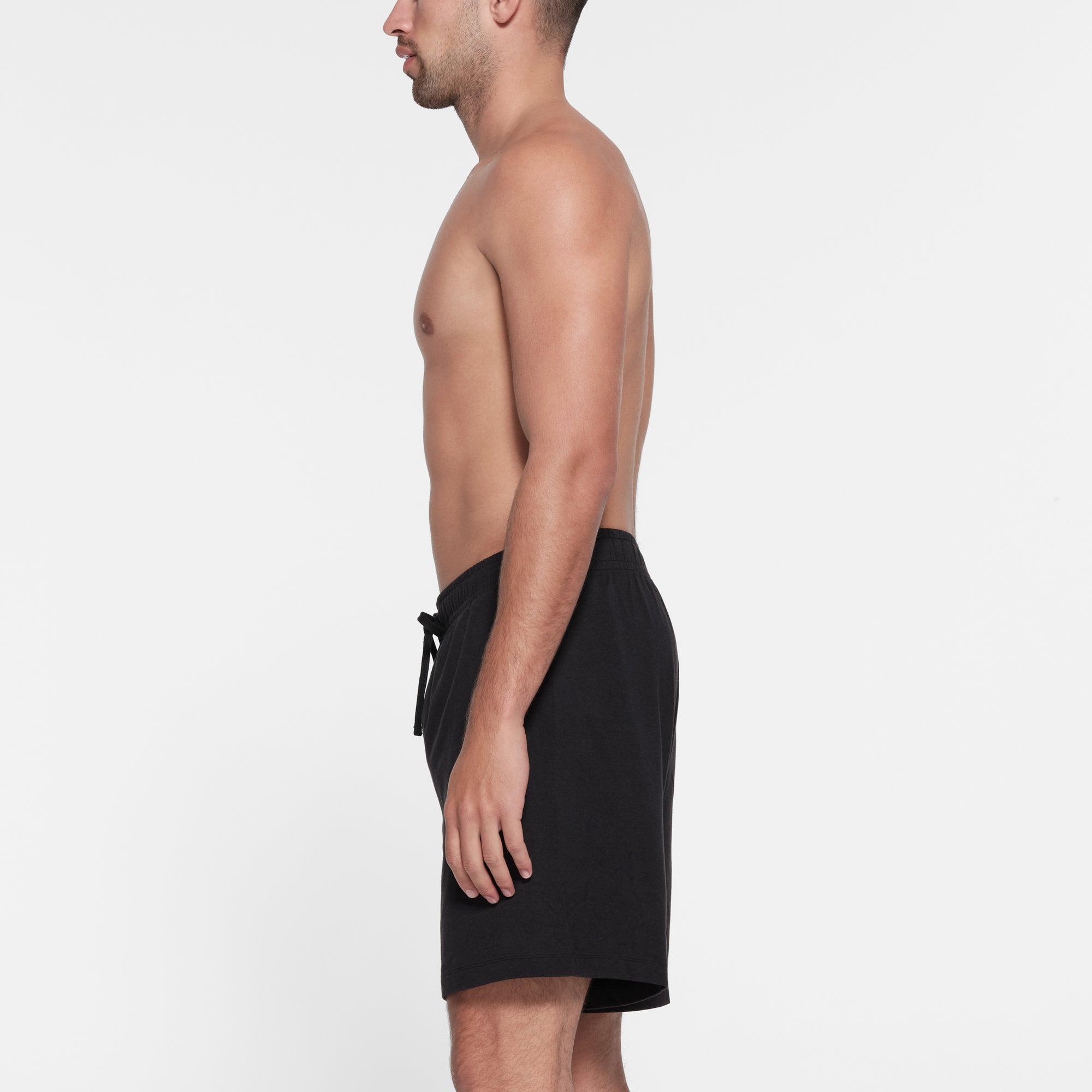 JERSEY LOUNGE MENS SHORT | OBSIDIAN ON A MODEL SIDE VIEW