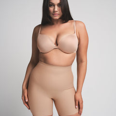 SKIMS BODY CORE SCULPT MID RISE SHORT | CLAY  ON A MODEL FRONT VIEW