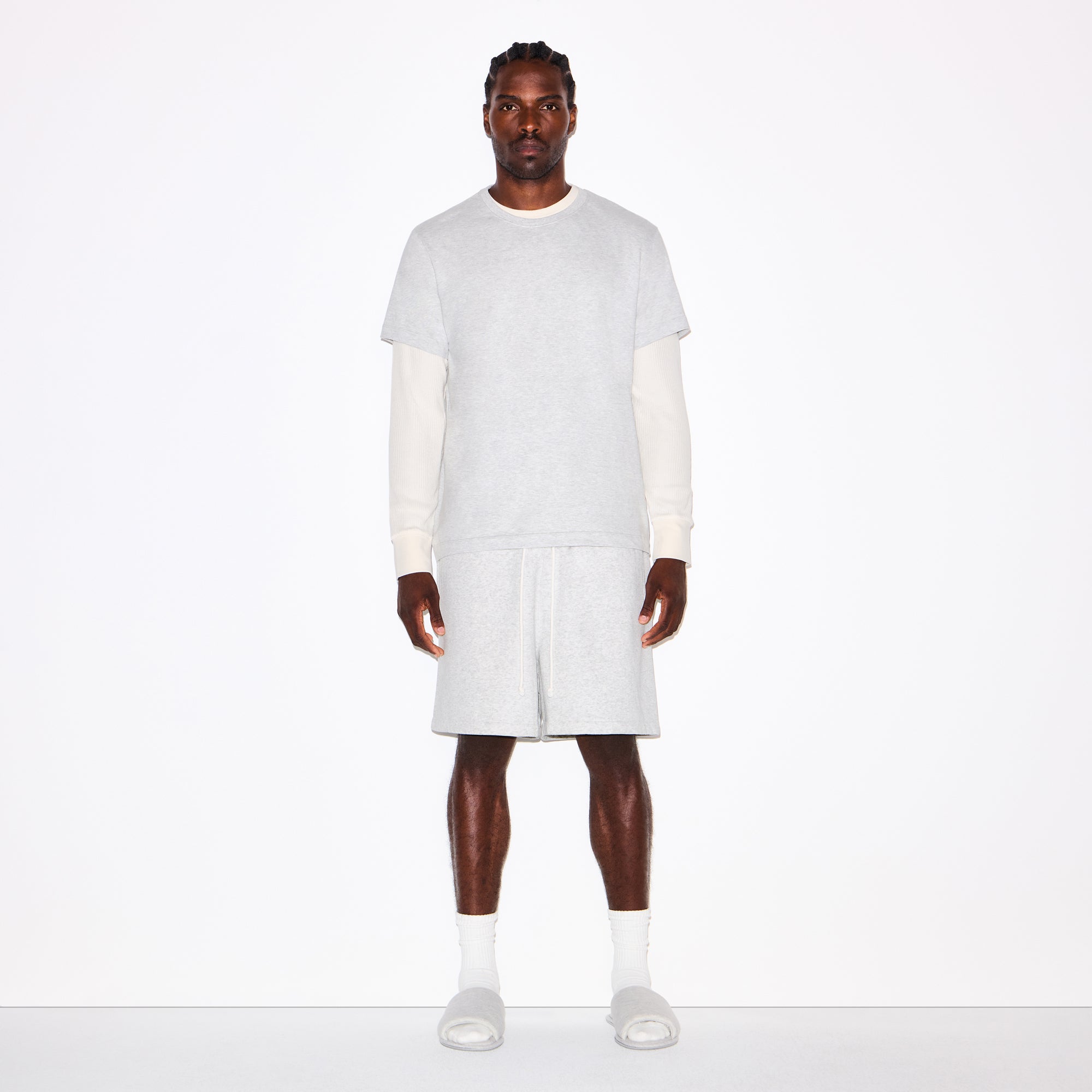 FLEECE LOUNGE MENS RELAXED SHORT | LIGHT HEATHER GREY ON A MODEL FRONT VIEW @ | FOCUS: 0.0, 1.0, 0.9