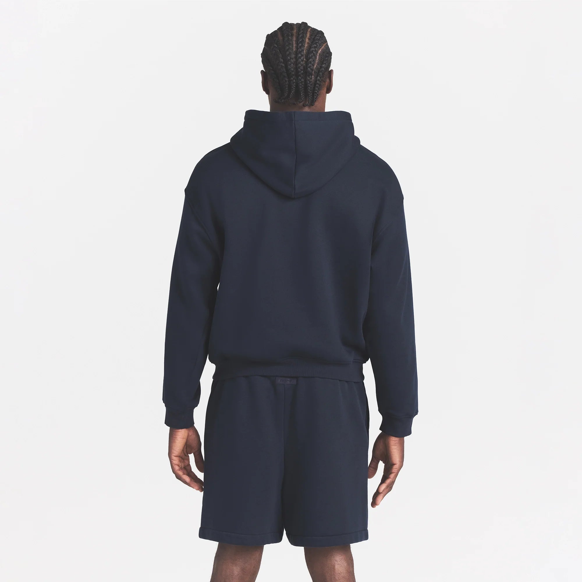 FLEECE LOUNGE MENS RELAXED SHORT | NAVY ON A MODEL BACK VIEW @ | FOCUS: 0.0, 1.0, 0.9