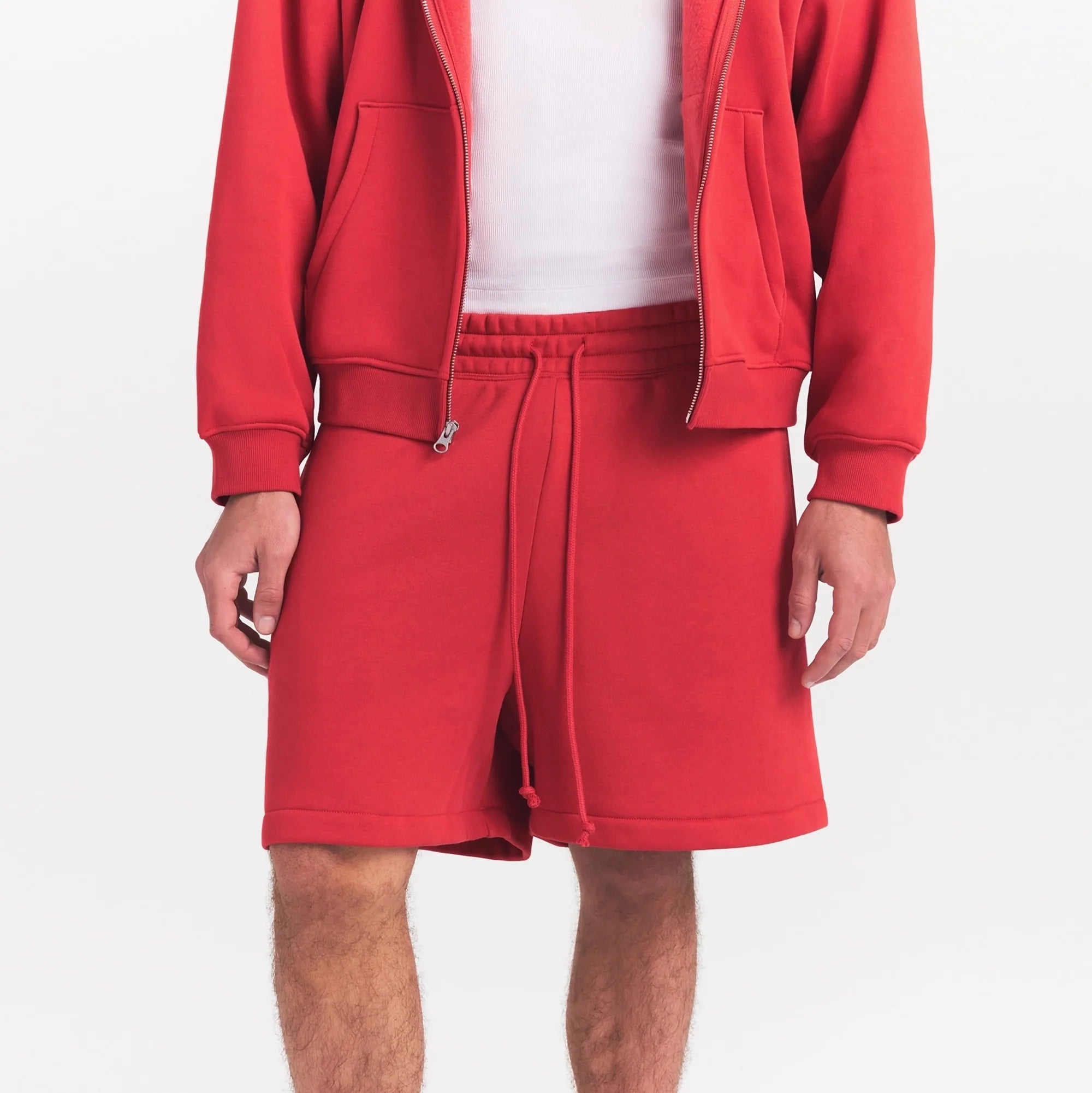 FLEECE LOUNGE MENS RELAXED SHORT | WASHED RED ON A MODEL SIDE VIEW @ | FOCUS: 0.0, 1.0, 0.9