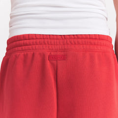 FLEECE LOUNGE MENS RELAXED SHORT | WASHED RED ON A MODEL SIDE VIEW @ | FOCUS: 0.0, 1.0, 0.9