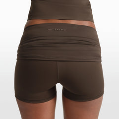 NikeSKIMS MATTE 3" FOLDOVER SHORT | DARK SEPIA ON A MODEL FRONT VIEW @ | FOCUS: 0.0, 1.0, 0.9