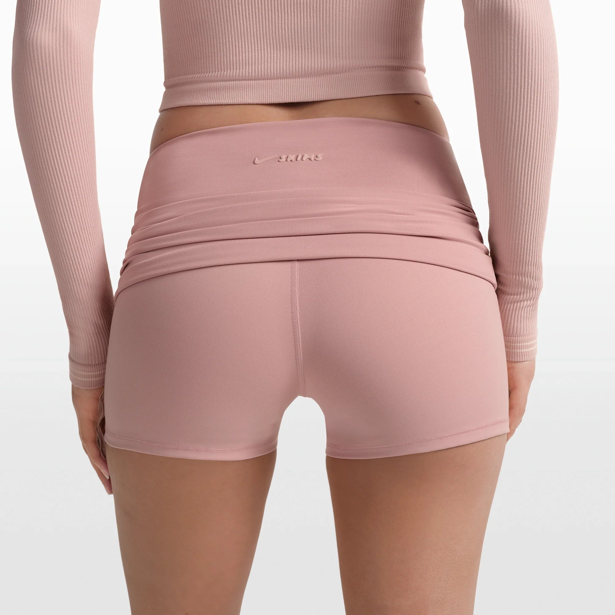 NikeSKIMS MATTE 3" FOLDOVER SHORT | HIMALAYAN ON A MODEL FRONT VIEW @ | FOCUS: 0.0, 1.0, 0.9