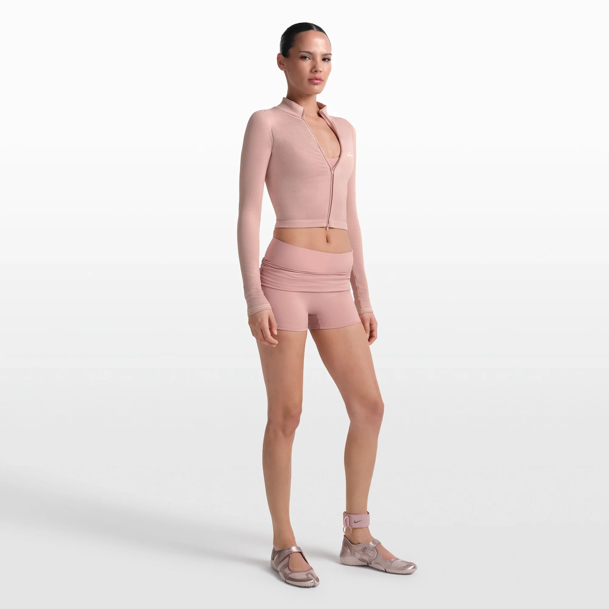 NikeSKIMS MATTE 3" FOLDOVER SHORT | HIMALAYAN ON A MODEL FRONT VIEW @ | FOCUS: 0.0, 1.0, 0.9