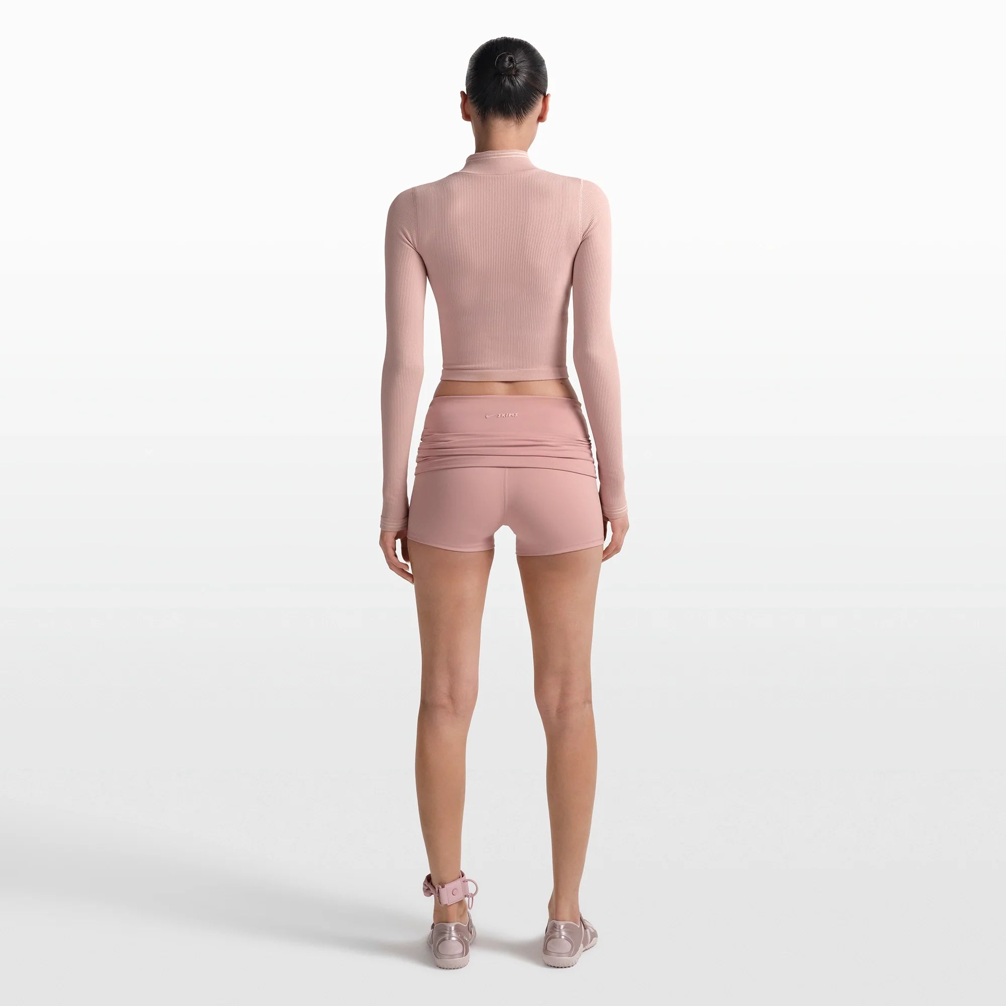 NikeSKIMS MATTE 3" FOLDOVER SHORT | HIMALAYAN ON A MODEL FRONT VIEW @ | FOCUS: 0.0, 1.0, 0.9