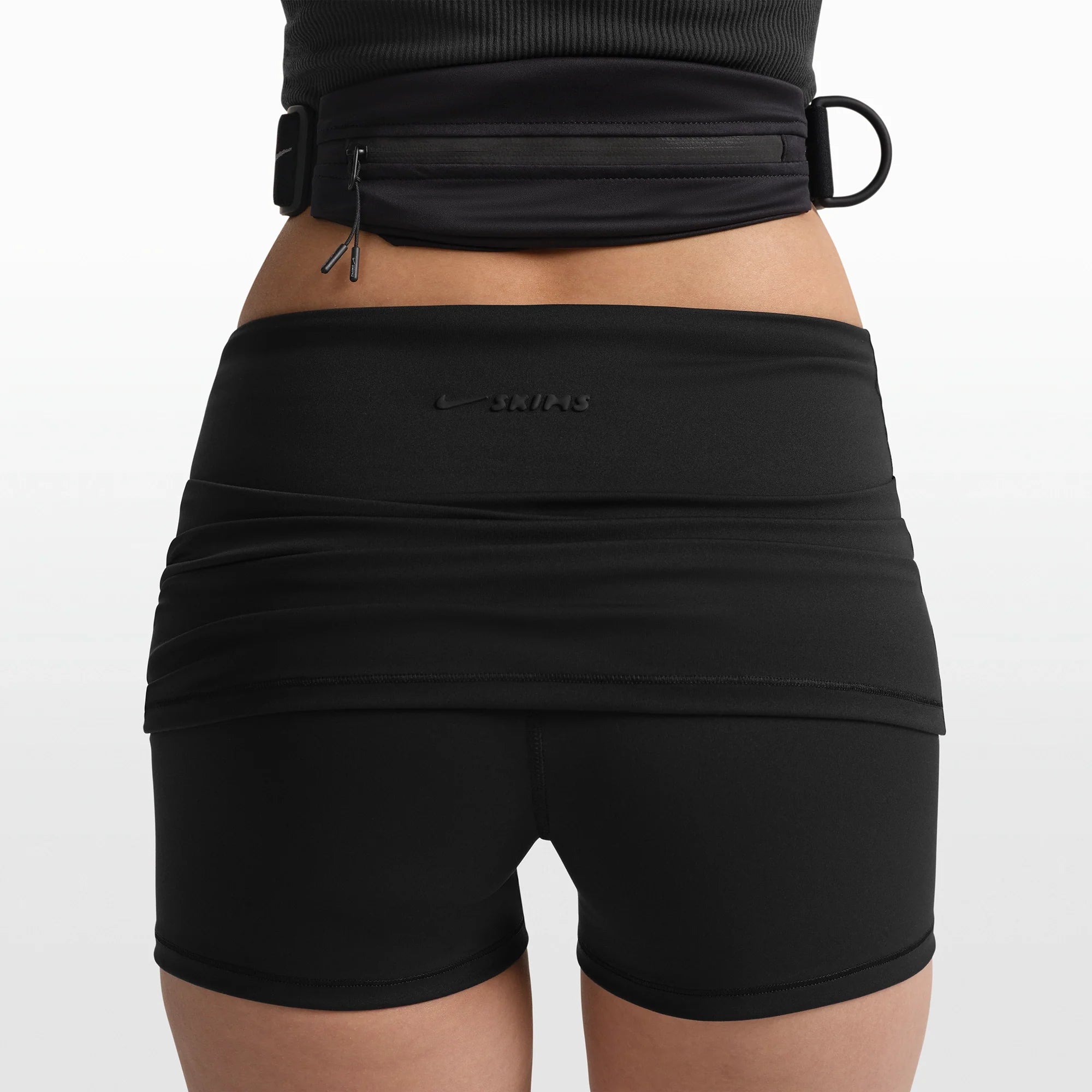 NikeSKIMS MATTE 3" FOLDOVER SHORT | OBSIDIAN ON A MODEL FRONT VIEW @ | FOCUS: 0.0, 1.0, 0.9