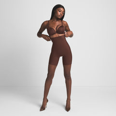 SKIMS BODY CORE SCULPT HIGH-WAISTED SHORT | COCOA ON A MODEL FRONT VIEW
