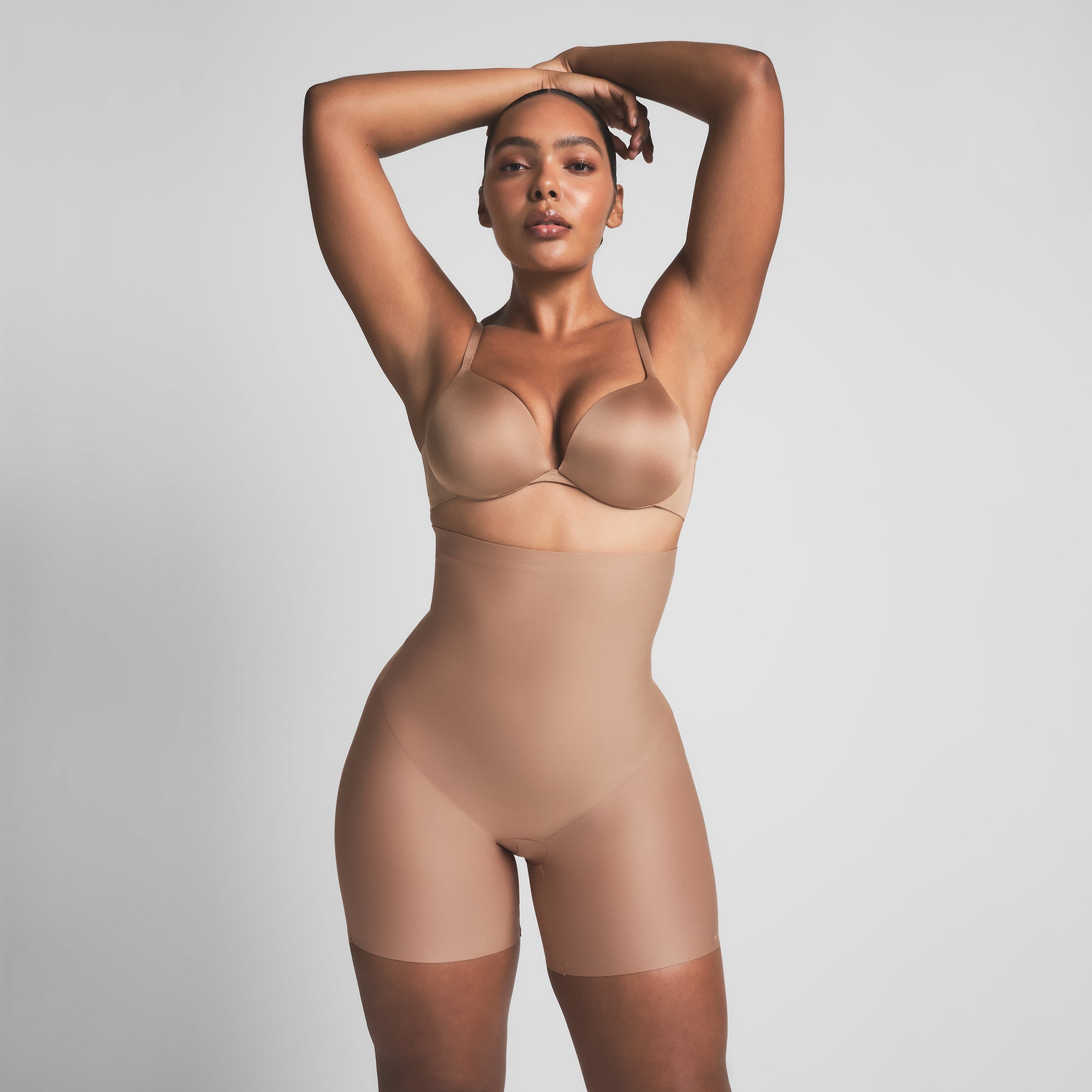 SKIMS BODY CORE SCULPT HIGH-WAISTED SHORT | SIENNA ON A MODEL FRONT VIEW