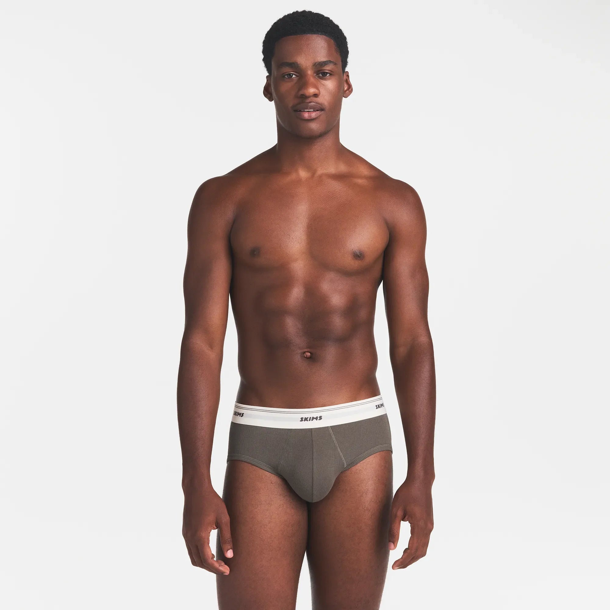 SKIMS COTTON RIB MENS BRIEF | JUNGLE ON A MODEL FRONT VIEW @ | FOCUS: 0.0, 1.0, 0.9