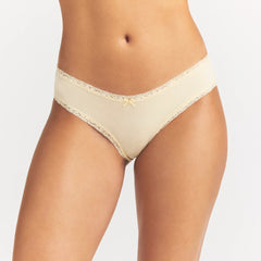 LIGHTWEIGHT COTTON LACE BRIEF | BUTTER TONAL ON A MODEL SIDE VIEW @ | FOCUS: 0.0, 1.0, 0.9