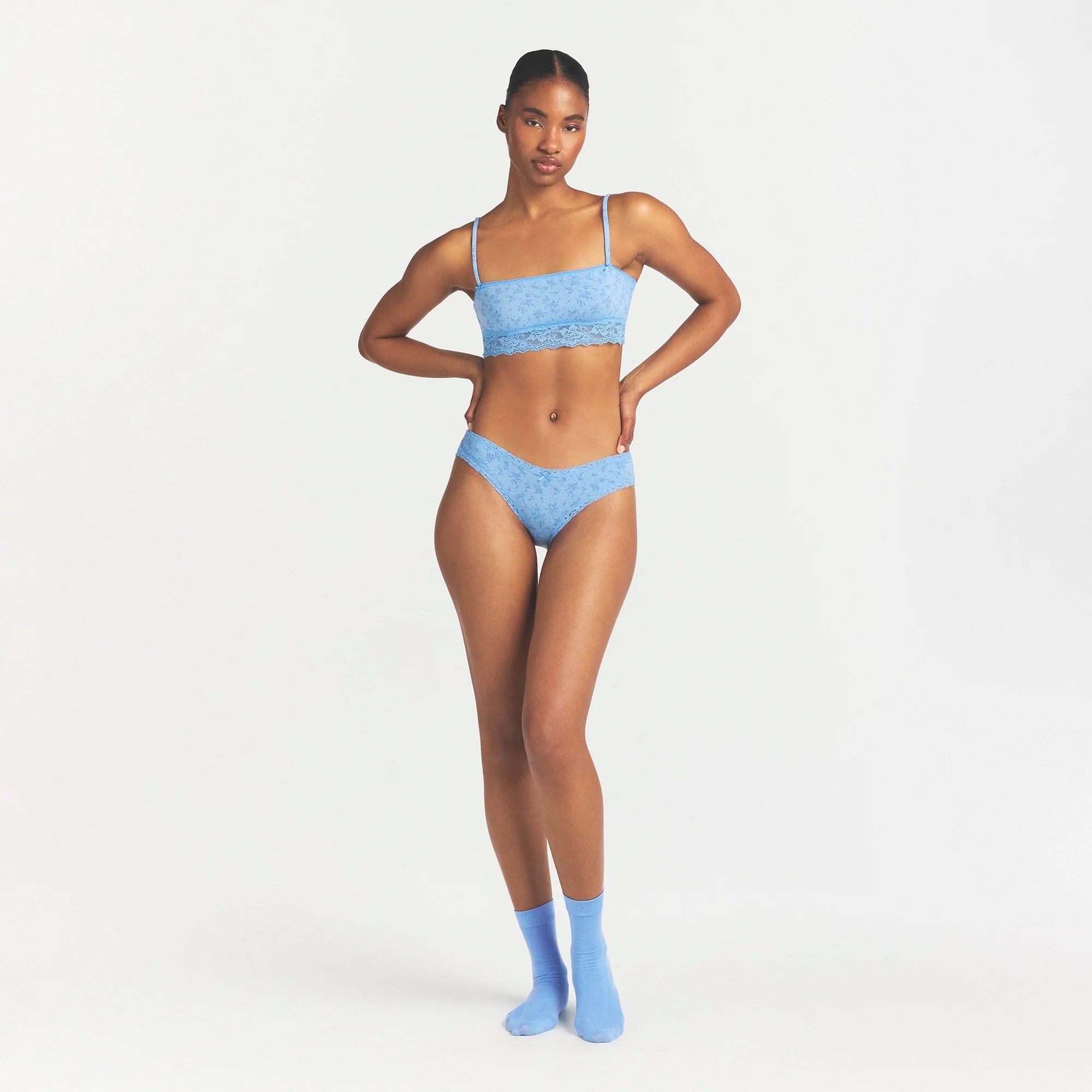 LIGHTWEIGHT COTTON LACE BRIEF | SURF DAINTY FLORAL PRINT ON A MODEL FRONT VIEW @ | FOCUS: 0.0, 1.0, 0.9