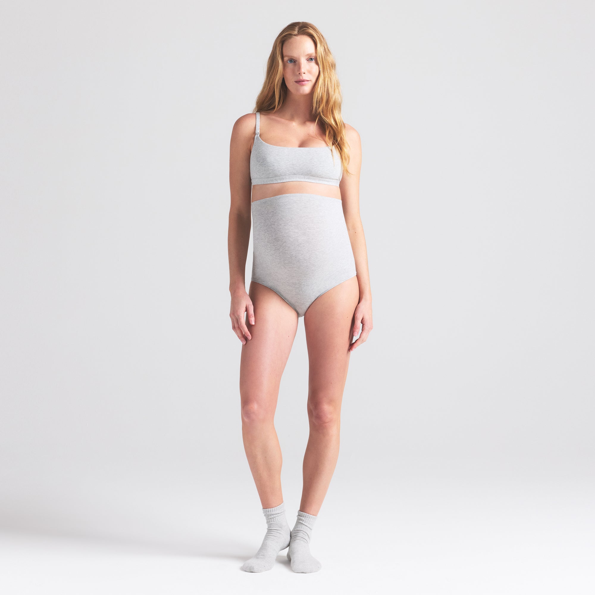 COTTON JERSEY MATERNITY HIGH-WAISTED BRIEF | LIGHT HEATHER GREY ON A MODEL FRONT VIEW | FOCUS: 0.0, 1.0, 0.9