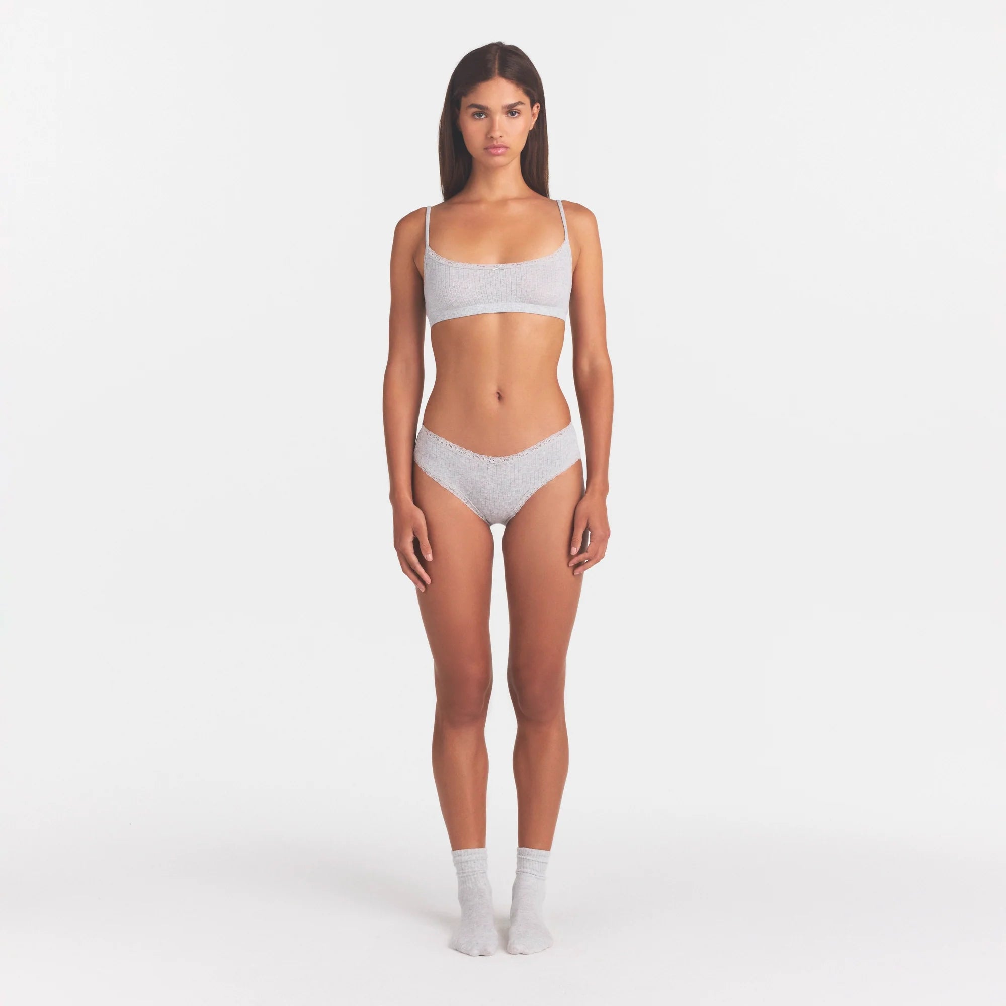 LIGHTWEIGHT COTTON POINTELLE LACE BRIEF | LIGHT HEATHER GREY ON A MODEL FRONT VIEW @ | FOCUS: 0.0, 1.0, 0.9
