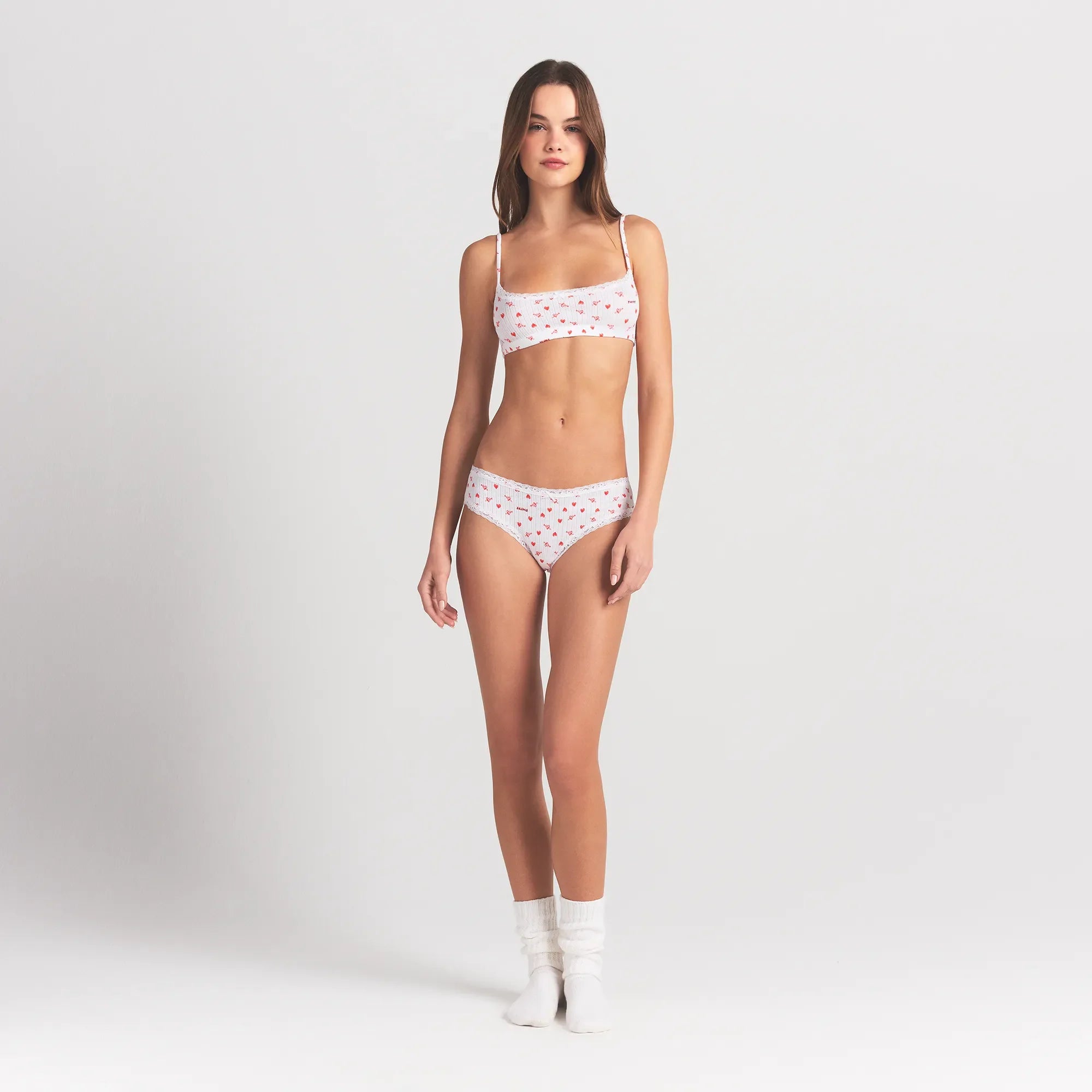 LIGHTWEIGHT COTTON POINTELLE LACE BRIEF | SNOW ARROWED HEARTS ON A MODEL FRONT VIEW @ | FOCUS: 0.0, 1.0, 0.9