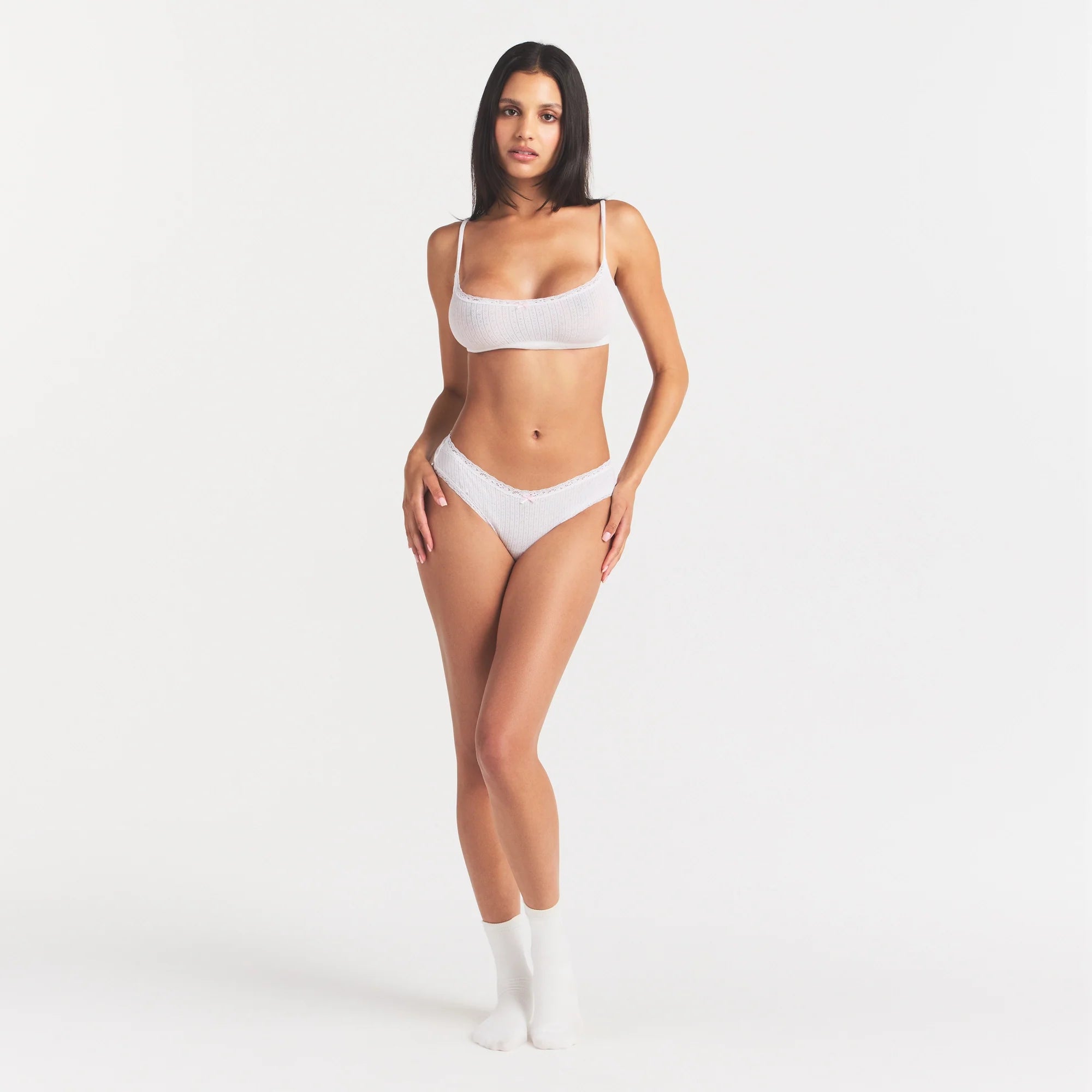 LIGHTWEIGHT COTTON POINTELLE LACE BRIEF | SNOW PEONY PIN DOT ON A MODEL FRONT VIEW @ | FOCUS: 0.0, 1.0, 0.9