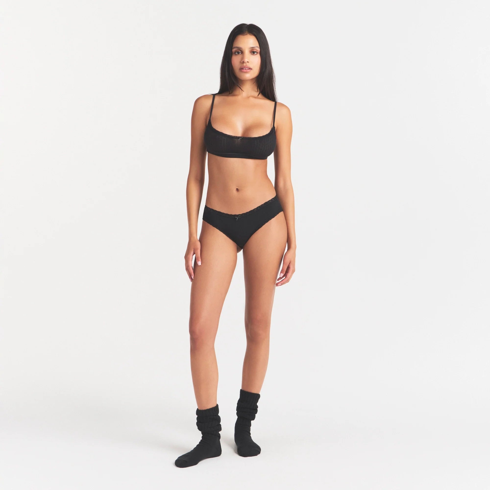 LIGHTWEIGHT COTTON POINTELLE LACE BRIEF | SOOT TONAL ON A MODEL FRONT VIEW | FOCUS: 0.0, 1.0, 0.9