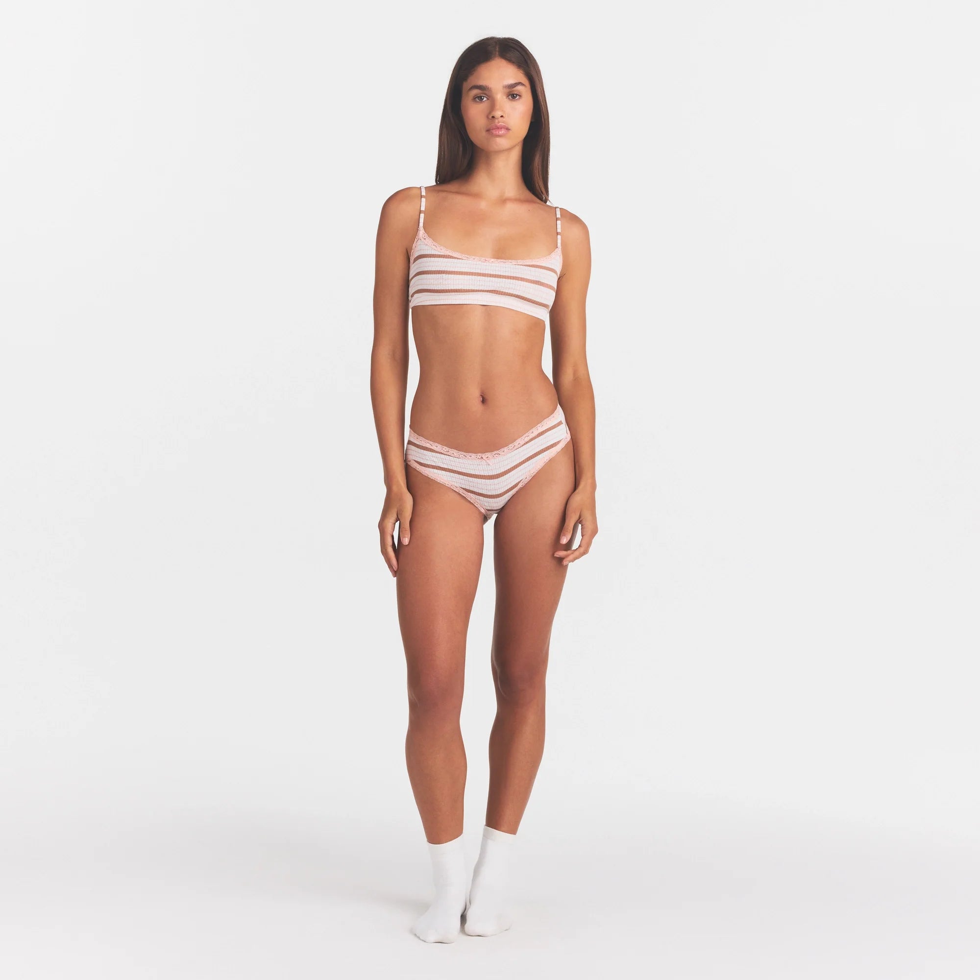 LIGHTWEIGHT COTTON POINTELLE LACE BRIEF | VILLA EGRET RUNWAY STRIPE ON A MODEL FRONT VIEW @ | FOCUS: 0.0, 1.0, 0.9
