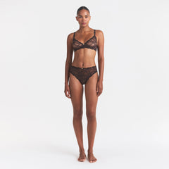 STRETCH LACE BRIEF | ESPRESSO ON A MODEL FRONT VIEW @ | FOCUS: 0.0, 1.0, 0.9