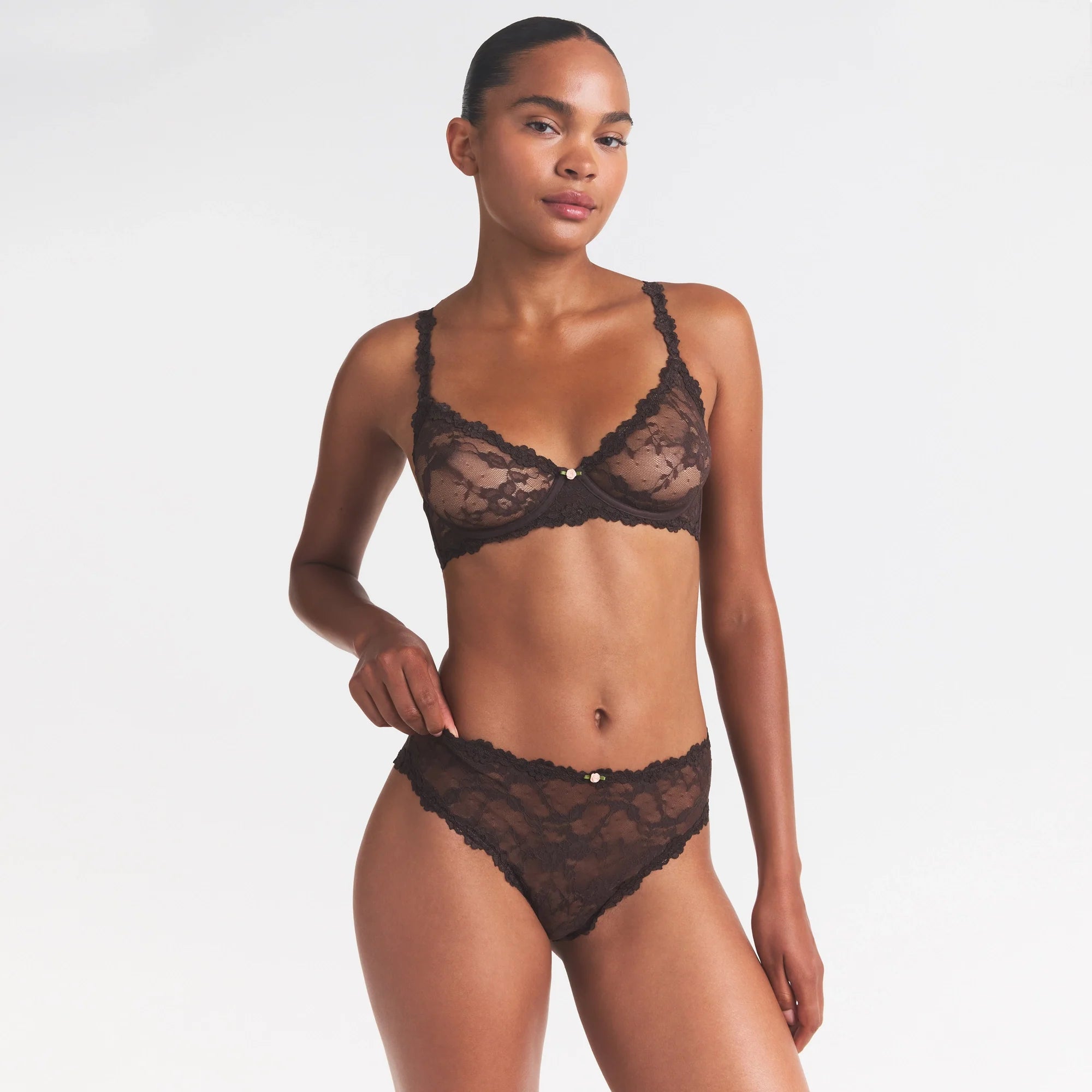 STRETCH LACE BRIEF | ESPRESSO ON A MODEL SIDE VIEW @ | FOCUS: 0.0, 1.0, 0.9