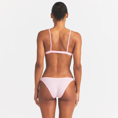 EVERYDAY COTTON TRIANGLE BRALETTE | PEONY ON A MODEL SIDE VIEW @ | FOCUS: 0.0, 1.0, 0.9