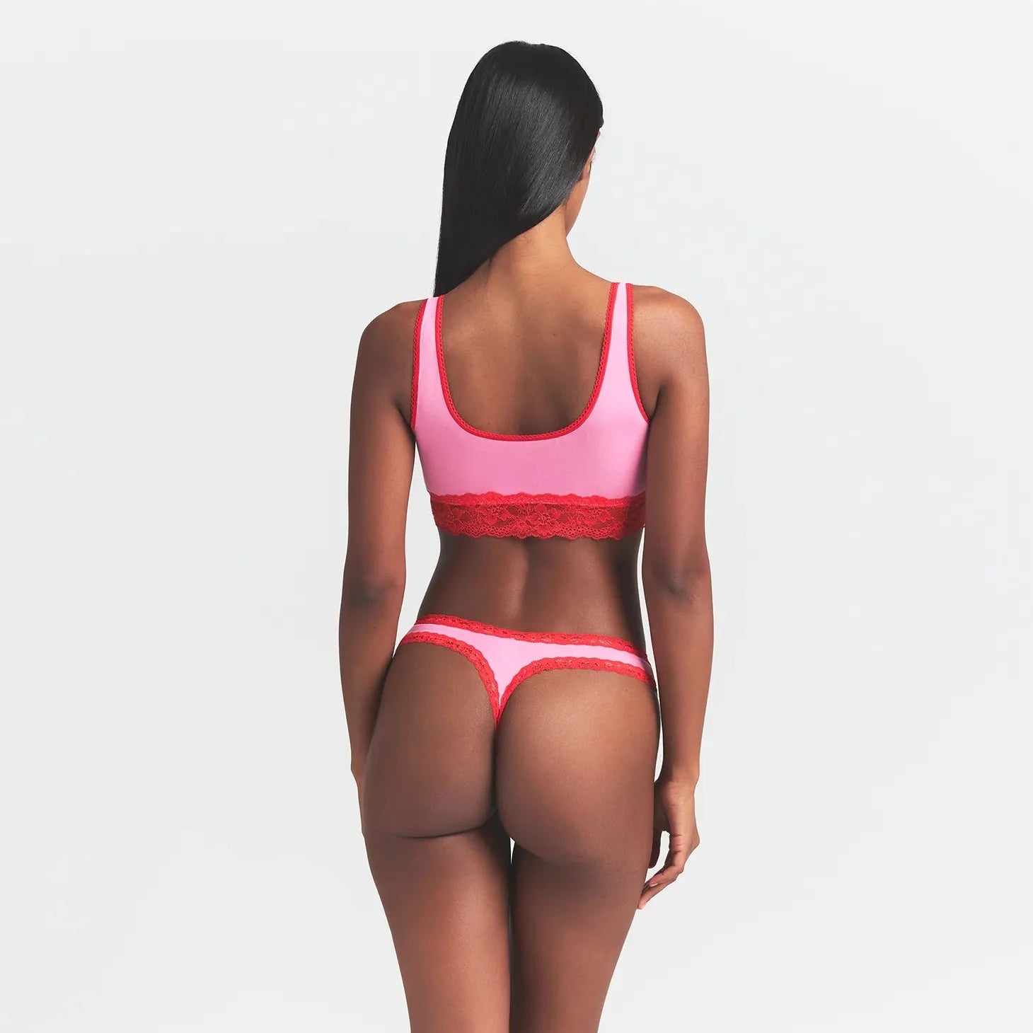 LIGHTWEIGHT COTTON LACE SCOOP BRALETTE | CARNATION CONTRAST ON A MODEL BACK VIEW @ | FOCUS: 0.0, 1.0, 0.9