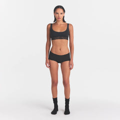 LIGHTWEIGHT COTTON LACE SCOOP BRALETTE | SOOT TONAL ON A MODEL FRONT VIEW