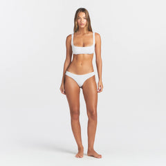 RAW EDGE COTTON MICRO SCOOP BRALETTE | SNOW ON A MODEL FRONT VIEW @ | FOCUS: 0.0, 1.0, 0.9