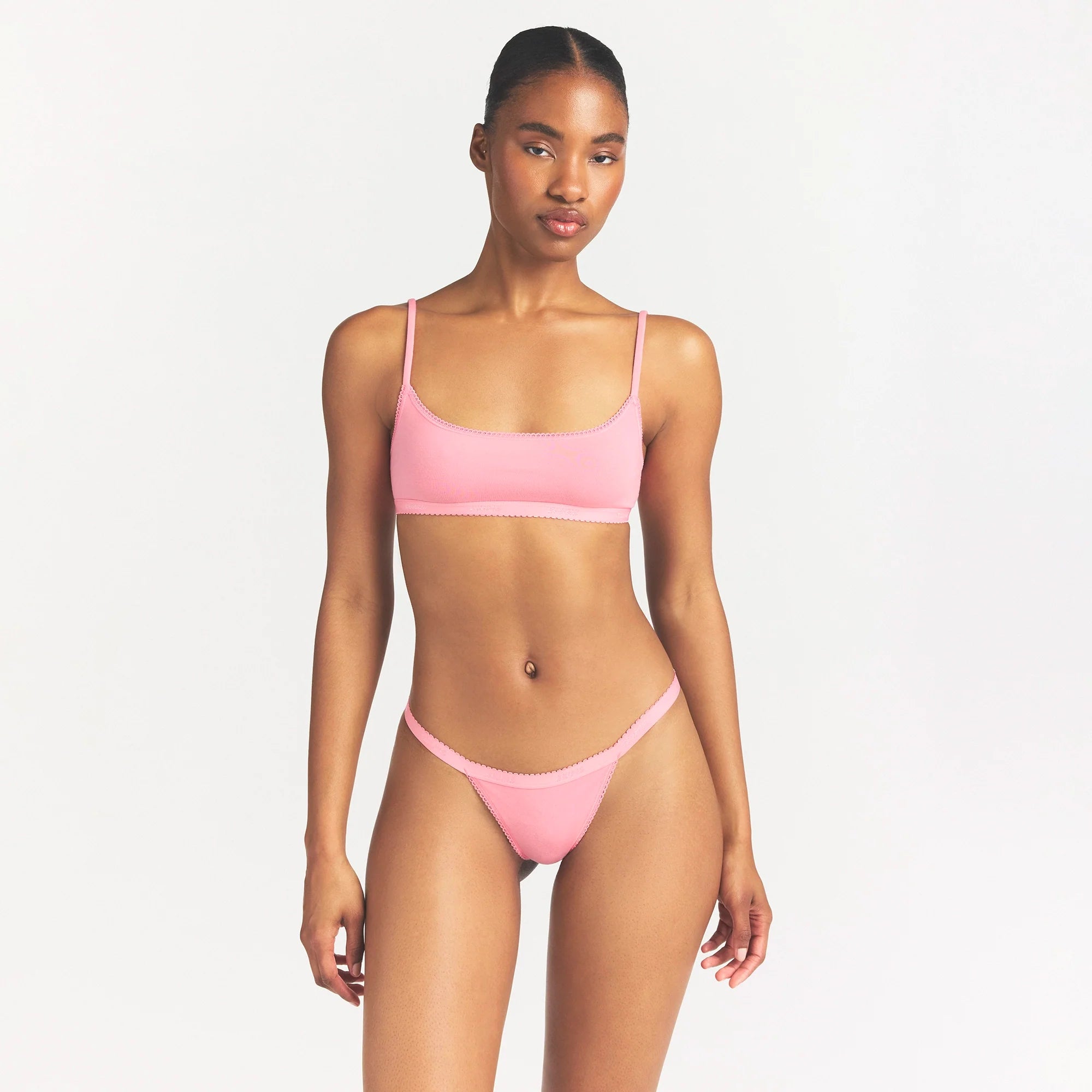 LIGHTWEIGHT COTTON LOGO PICOT SCOOP BRALETTE | MELON TONAL ON A MODEL SIDE VIEW @ | FOCUS: 0.0, 1.0, 0.9