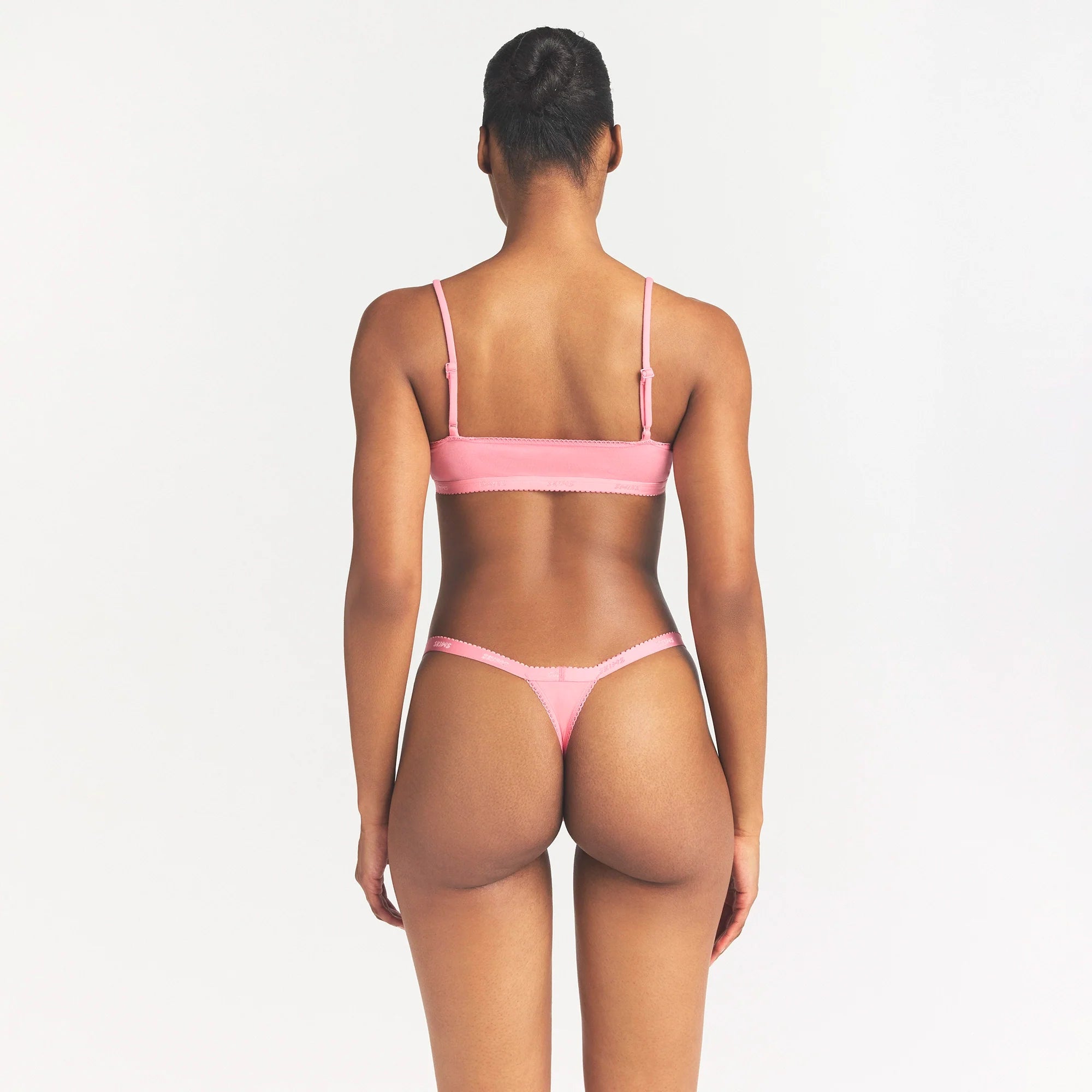 LIGHTWEIGHT COTTON LOGO PICOT SCOOP BRALETTE | MELON TONAL ON A MODEL SIDE VIEW @ | FOCUS: 0.0, 1.0, 0.9