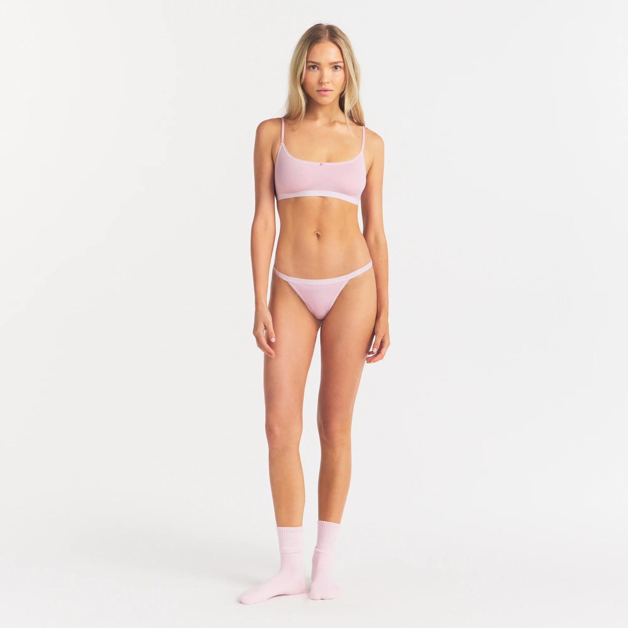 LIGHTWEIGHT COTTON LOGO PICOT SCOOP BRALETTE | PEONY ON A MODEL FRONT VIEW @ | FOCUS: 0.0, 1.0, 0.9