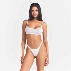LIGHTWEIGHT COTTON LOGO PICOT SCOOP BRALETTE | SNOW ON A MODEL SIDE VIEW