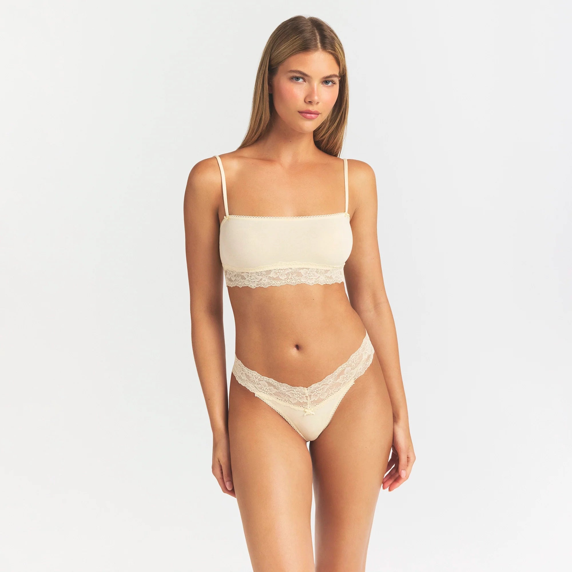 LIGHTWEIGHT COTTON STRAIGHT NECK BRALETTE | BUTTER TONAL ON A MODEL SIDE VIEW @ | FOCUS: 0.0, 1.0, 0.9