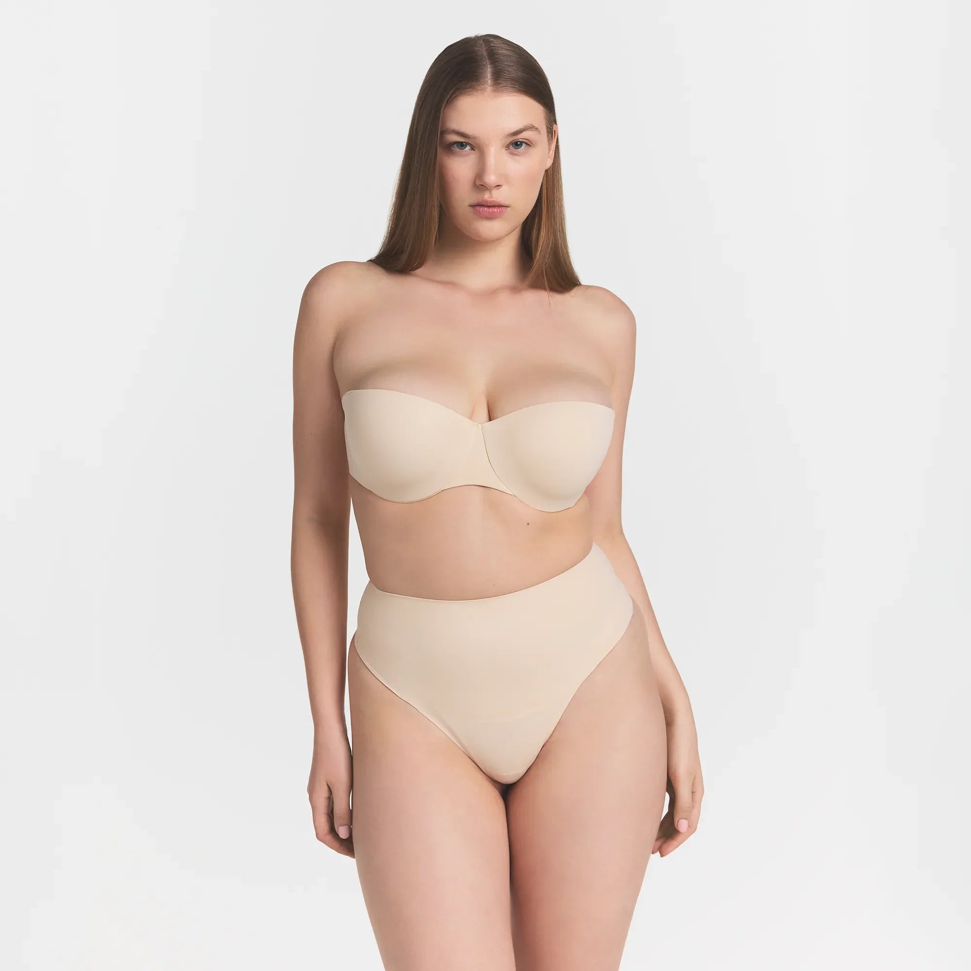 SMOOTHING INTIMATES STRAPLESS BRA | SAND ON A MODEL FRONT VIEW @ | FOCUS: 0.0, 1.0, 0.9