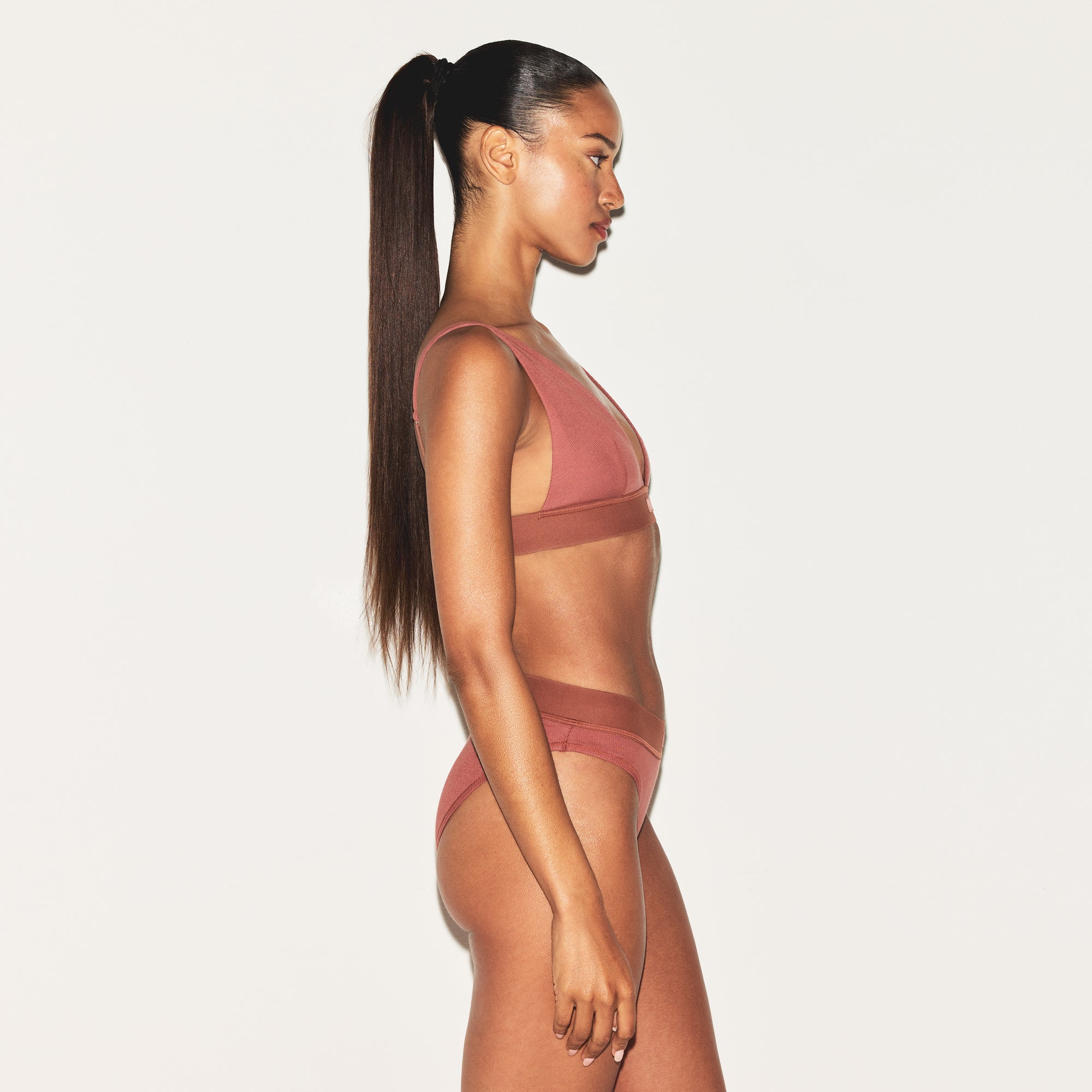 COTTON RIB PLUNGE BRALETTE | REDWOOD ON A MODEL SIDE VIEW | FOCUS: 0.0, 1.0, 0.9
