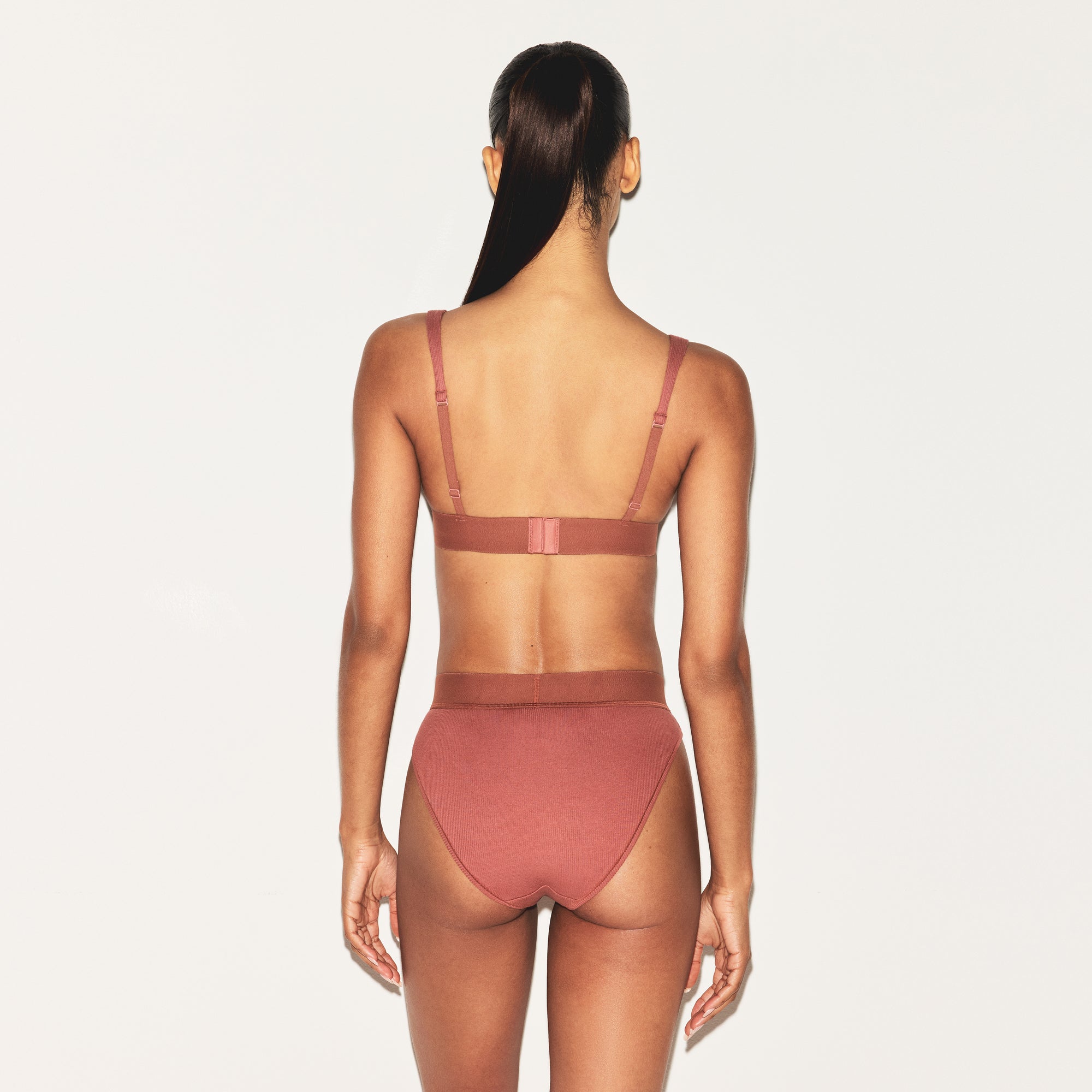 COTTON RIB PLUNGE BRALETTE | REDWOOD ON A MODEL SIDE VIEW | FOCUS: 0.0, 1.0, 0.9
