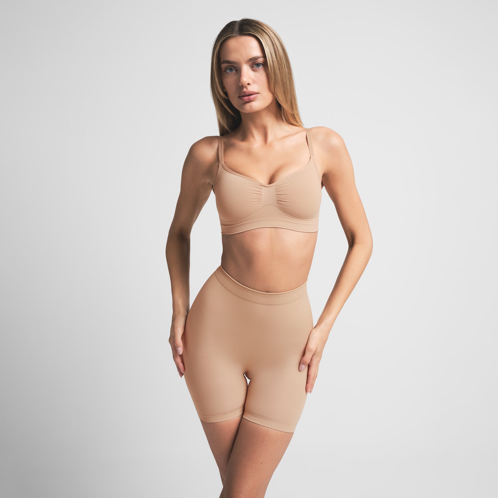 SEAMLESS SCULPT BRALETTE | CLAY ON A MODEL FRONT VIEW